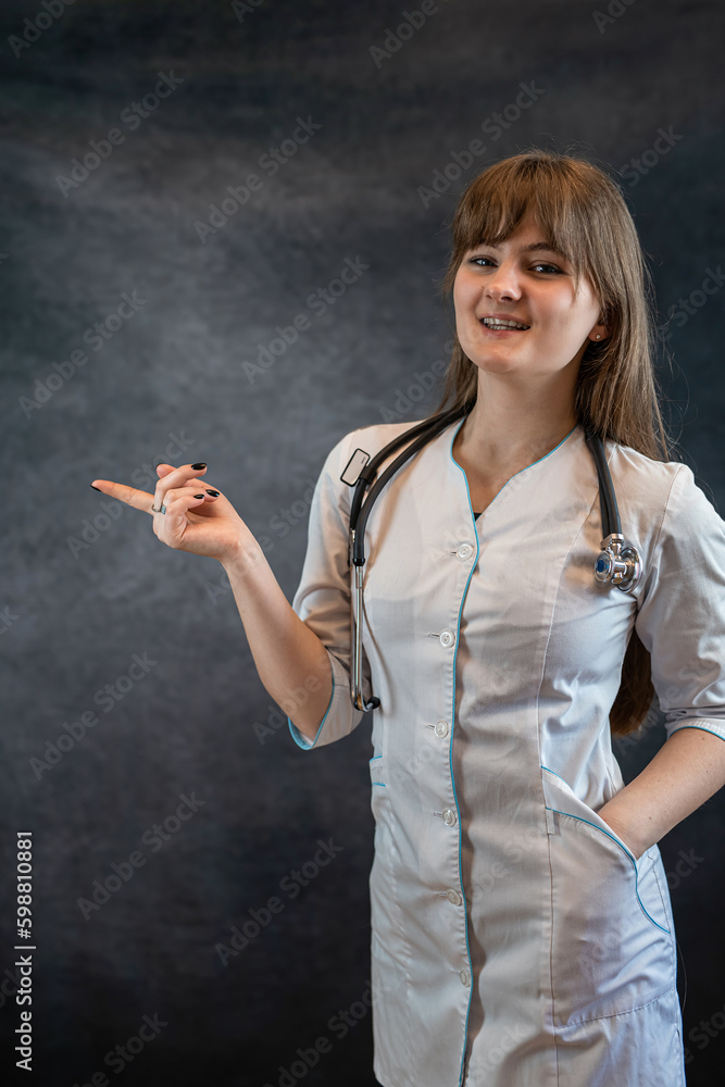 beautiful doctor in white uniform medical lab coat showing with hand and pointing with finger beautiful doctor in white uniform medical lab coat showing with hand and pointing with finger