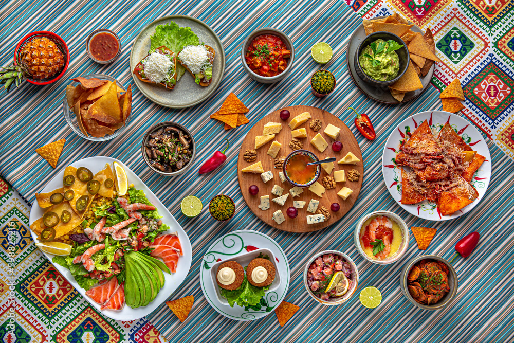 Traditional mexican food. Cheese plateau. Colorful Food Table Celebration Delicious Party Meal Concept. 