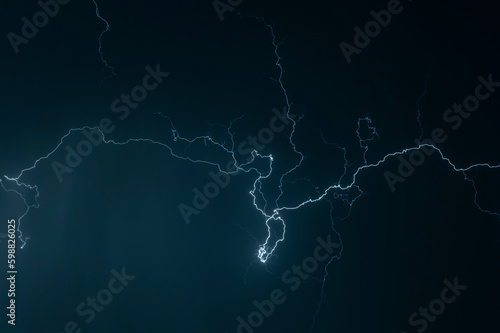 Beautiful Lightning Strikes and Clouds at Night in Lugano, Ticino, Switzerland. © Mats Silvan