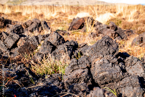 Peat Turf cutting in County Donegal - Ireland