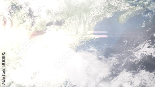 Earth zoom in from outer space to city. Zooming on New Rochelle, New York, USA. The animation continues by zoom out through clouds and atmosphere into space. Images from NASA