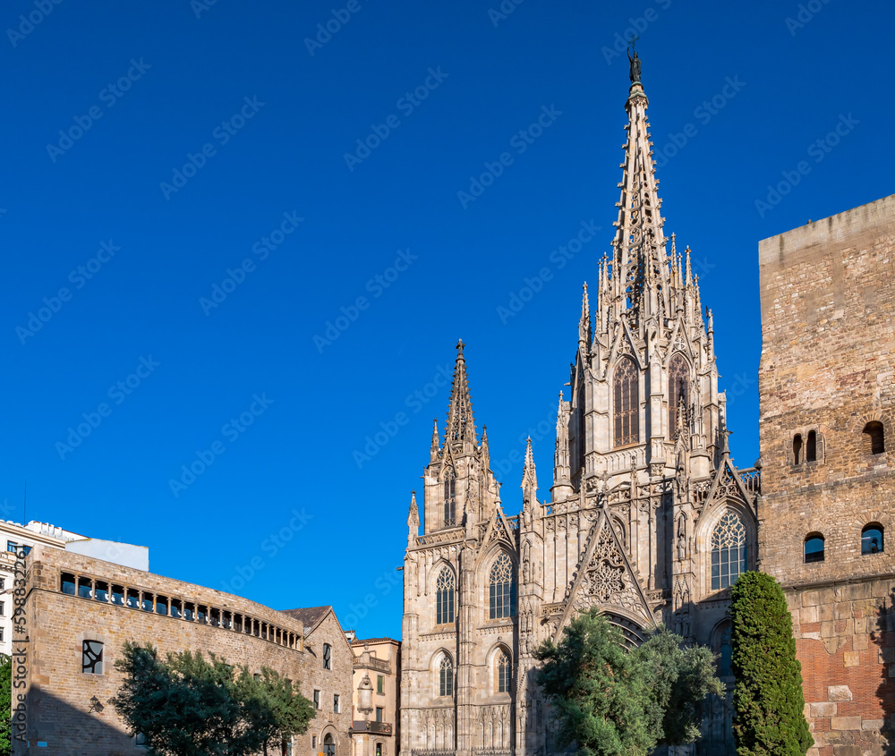 View of the Cathedral of the Holy Cross and Saint Eulalia of Barcelona, Spain located in Gothic Quarter on a sunny day.
