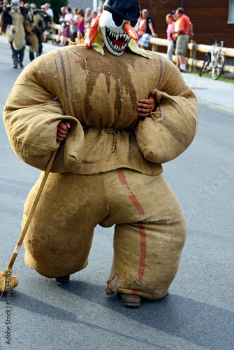 Swiss folklore event, man disguised as Tschäggättä, traditional Valasian frightening figure, International Alphorn Festival, Nendaz, canton Valais, canton Wallis, Switzerland, Europe photo