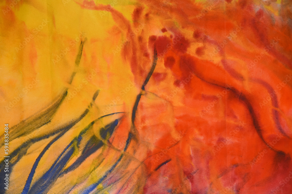 Artistic abstract texture. Yellow and orange stain with blue strokes, light orange tone background