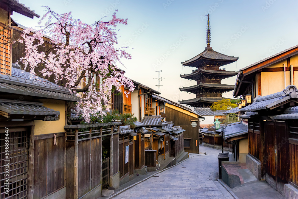 Naklejka premium Japan - April 1, 2023 : Scenic view of Ancient District of Kyoto with Yasaka Pagoda Background, Yasaka Pagoda is one of most famous landmark and tourist destination in Kyoto