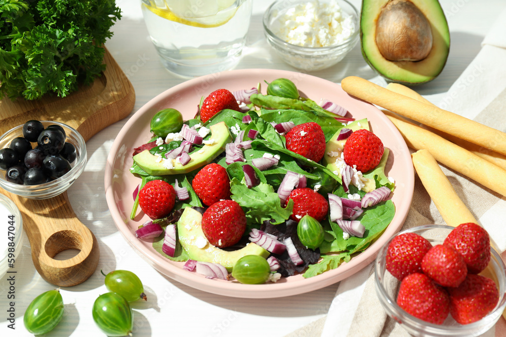 Concept of tasty food, salad with strawberry Concept of tasty food, salad with strawberry