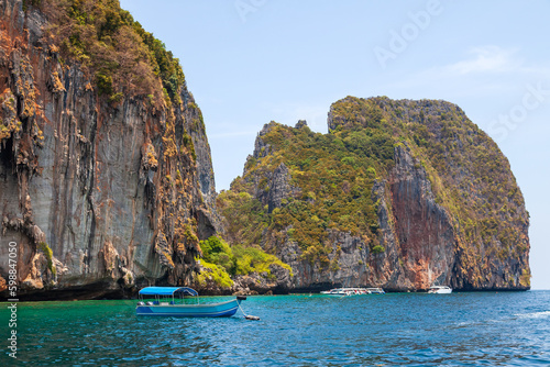 island phi phi leh and boat in thailand andaman sea. travel during vacation to the hot countries of asia.