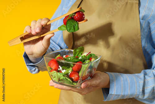 Concept of tasty food, salad with strawberry