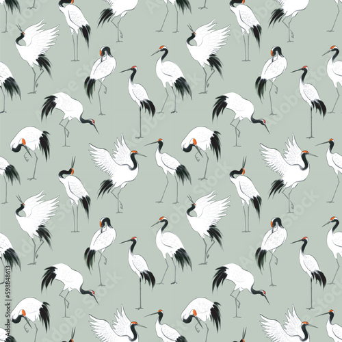 Seamless pattern with red-crowned japanese cranes in oriental style. Can be used for wallpaper, pattern fills, textile, web page background, surface textures. © elinacious