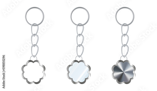 A set of silver or steel key chains in the shape of a flower. Chains made of metal or alloy. Metal key holders isolated on white background.