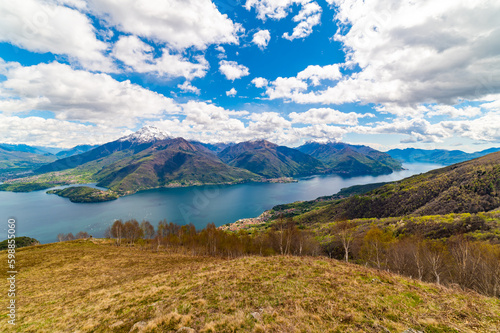View of Lake Como, towards the south, from the church of San Bernardo in Musso, with the mountains above, Dervio, the streets and the villages bordering the lake.
