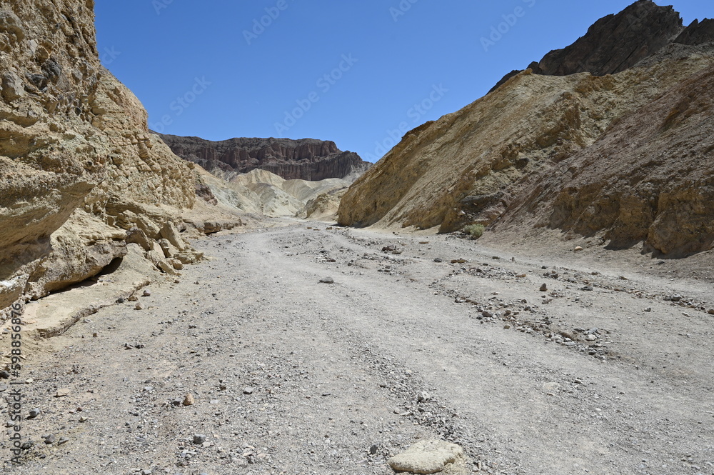 Golden Canyon Trail Head walk in Death Valley at Midday. 