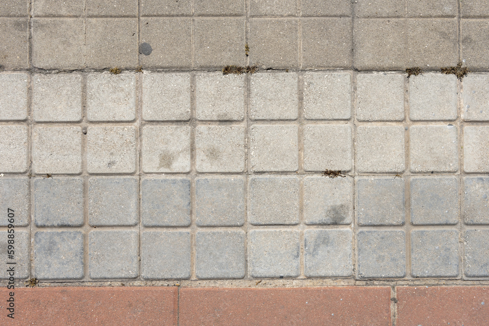 Obraz premium A floor covered with typical small square cement tiles