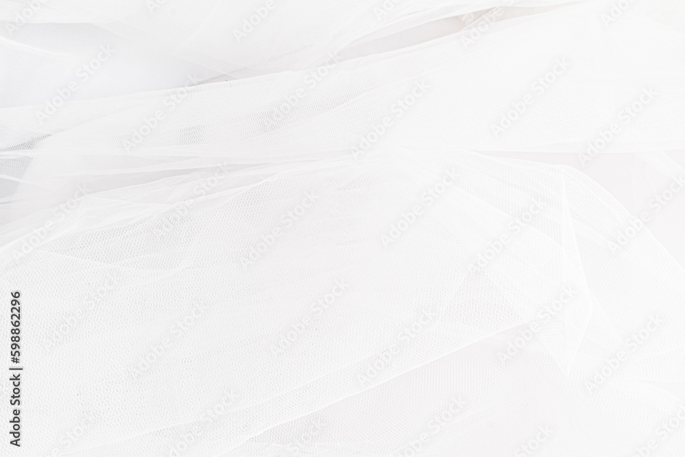The soft folds of the veil of the bride's traditional wedding accessory. Wedding background. layout for design.