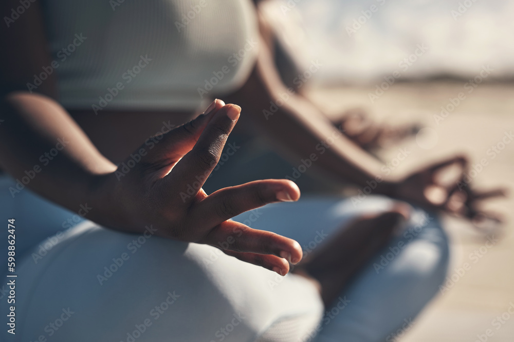 Yoga is a divine connection I cannot explain. a woman meditating during her yoga routine on the beach. Yoga is a divine connection I cannot explain. a woman meditating during her yoga routine on the beach.