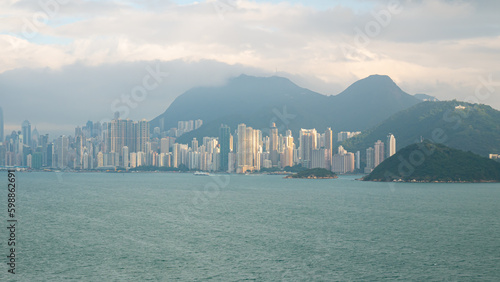 Photography View of Hong Kong Victoria Harbour cityscape with many skyscraper buildings from sea