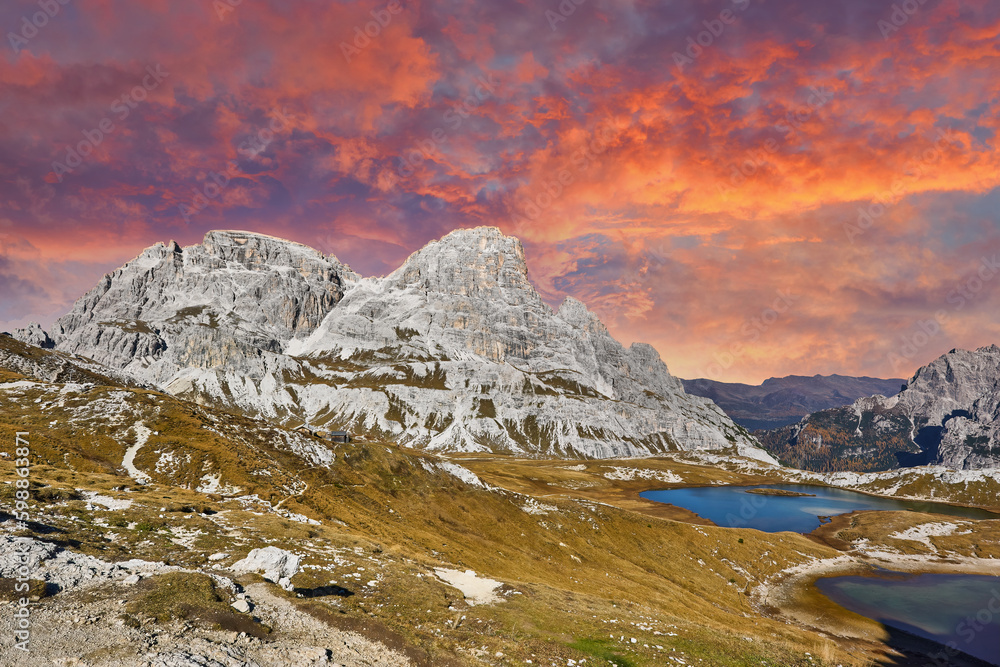 Alpine lakes near Lavaredo refuge in mountain valley on sunny day, Tre Cime National Park, Dolomites Mountains