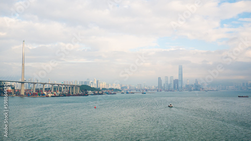 Photography View of Hong Kong Victoria Harbour cityscape with many skyscraper buildings from sea