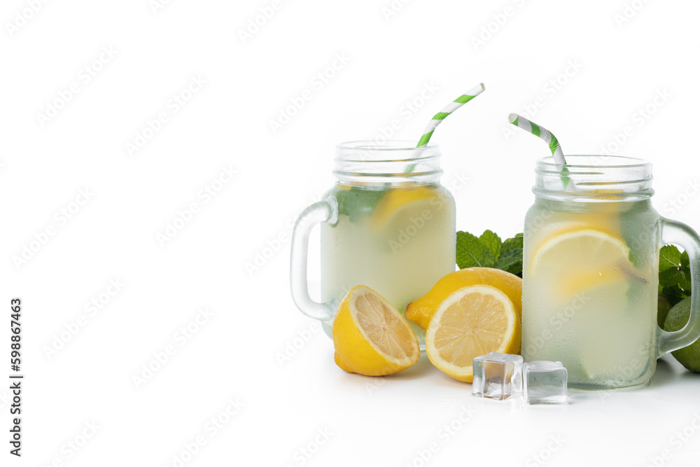 Lemonade drink in a jar glass and ingredients isolated on white background. Copy space Lemonade drink in a jar glass and ingredients isolated on white background. Copy space
