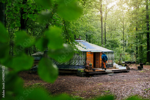 Glamping among trees in forest