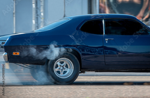 American muscle car burning rubber