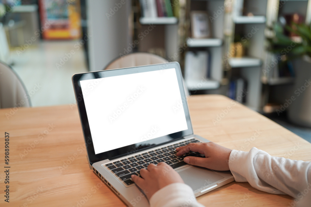 Woman Working by using laptop blank screen computer . Hands typing on a keyboard.technology e-commerce concept. Woman Working by using laptop blank screen computer . Hands typing on a keyboard.technology e-commerce concept.