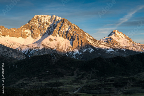Snow-covered Pe  a Ubi  a massif in the Natural Park of Babia y Luna at sunset  province of Leon  Castilla y Leon  Spain.
