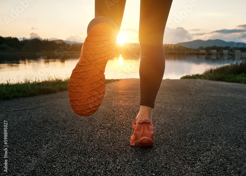 Woman running outdoors. Healthy lifestyle concept  people go in sports. Silhouette family at sunset. Health care  authenticity  sense of balance and calmness. 