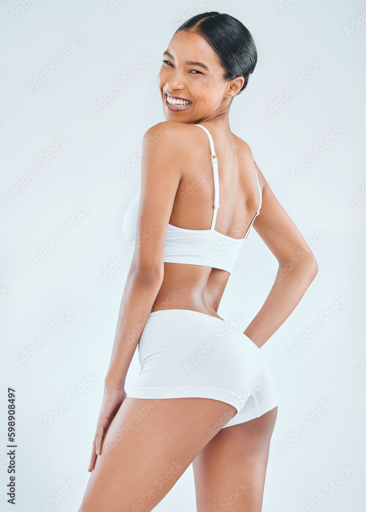Can you tell I do squats. an attractive young woman standing alone in the studio and posing in her underwear. Can you tell I do squats. an attractive young woman standing alone in the studio and posing in her underwear.