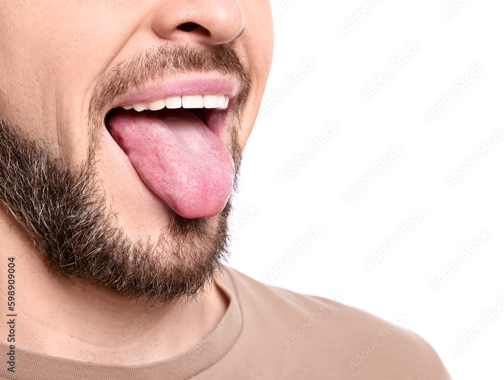 Happy man showing his tongue on white background, closeup Happy man showing his tongue on white background, closeup