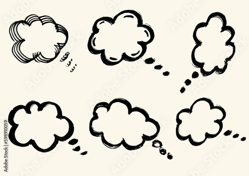 Set of brush hand drawn thinking clouds. Doodle chat cartoon bubbles. Vector, isolated