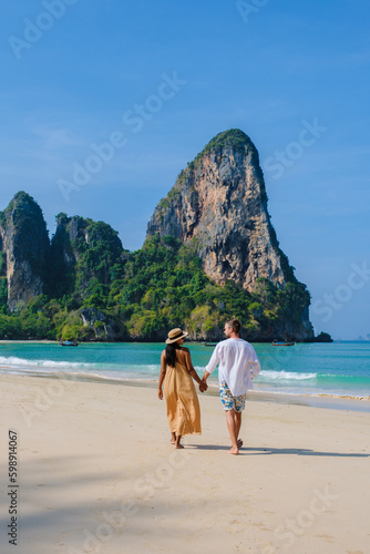 A couple of men and women at Railay Beach Krabi Thailand, the tropical beach of Railay Krabi