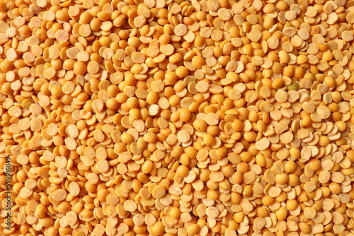 Dry organic lentils or chana channa dal top view background or texture. Healthy spices, nuts, seeds and herbal products.