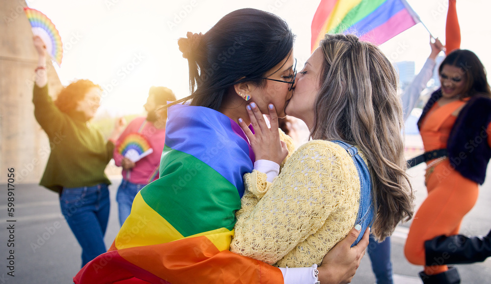 Two Young Loving Girls Kissing On Gay Pride Festival Day Outdoors 
