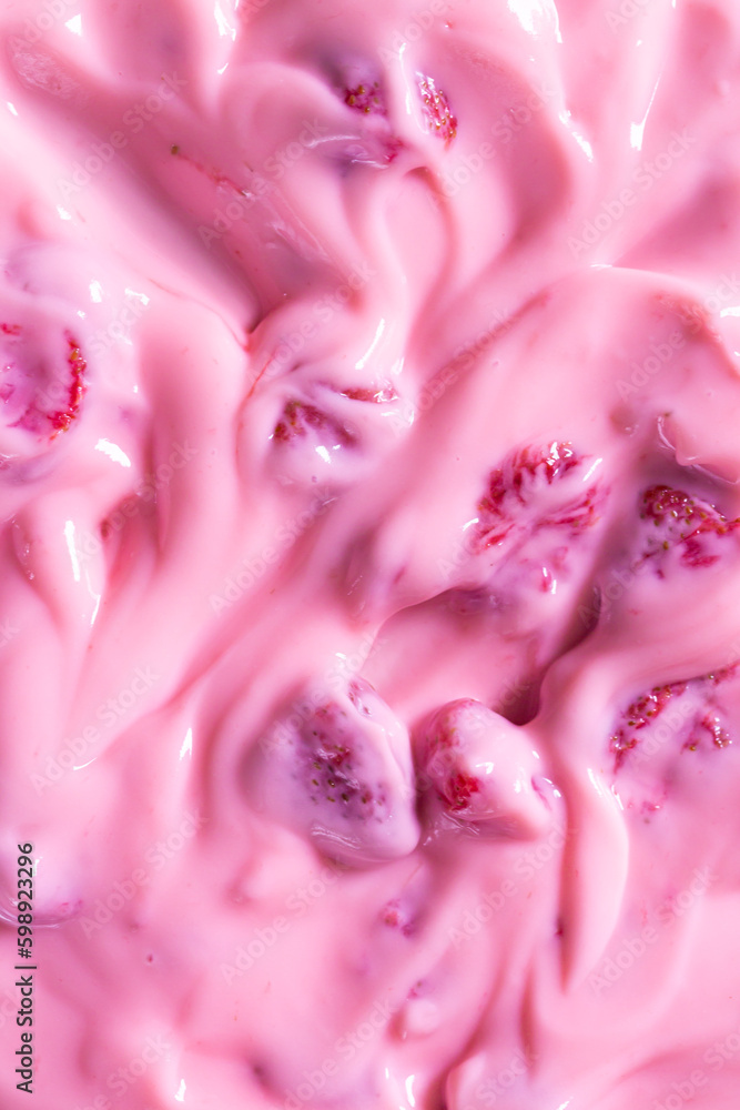 Fototapeta premium strawberry flavored yogurt background,Texture of ice cream with strawberries and raspberries
