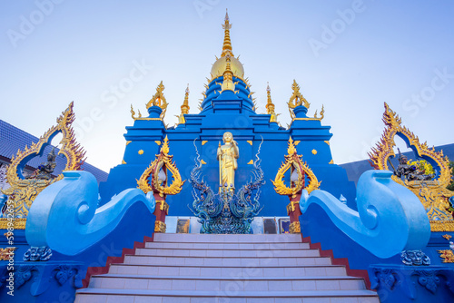The Wat Rong Suea Ten (Blue Temple) in Chiang Rai, Thailand photo