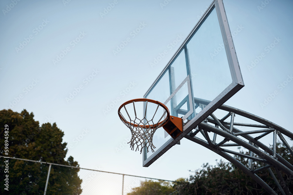 Take the shot. Closeup shot of a basketball hoop on a sports court. Take the shot. Closeup shot of a basketball hoop on a sports court.