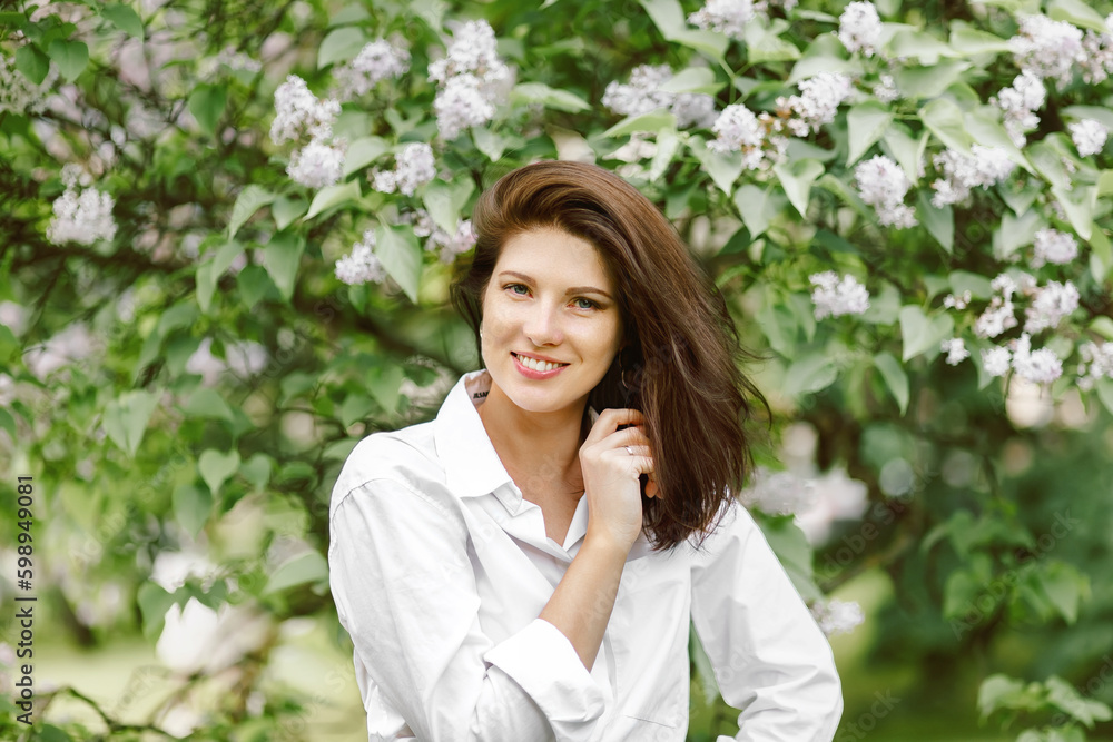 Portrait of happy woman with red hair wearing white shirt in nature Portrait of happy woman with red hair wearing white shirt in nature