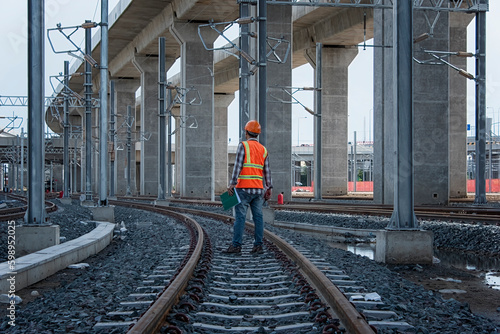 Engineer sitting on railway inspection. construction worker on railways. Engineer work on Railway. Rail, engineer, Infrastructure