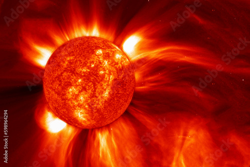 The sun in space on a dark background. Elements of this image furnished NASA.