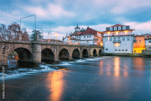 Roman bridge of Chaves or Trajano bridge over the river Tâmega in the city of Chaves in Portugal, at dusk.