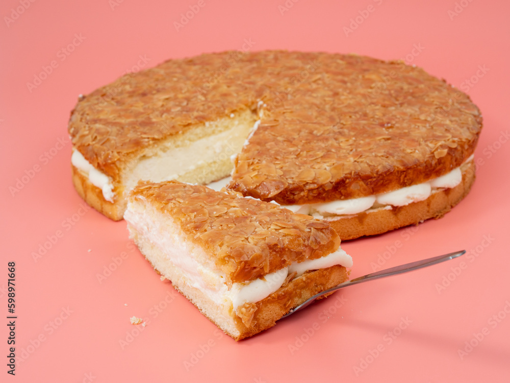 Bee sting cake, light cake with cream filling, with crispy almonds. Bee sting cake, light cake with cream filling, with crispy almonds.