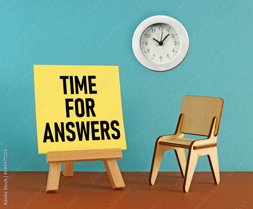 Time for answers is shown using the text and photo of clock Stock Photo