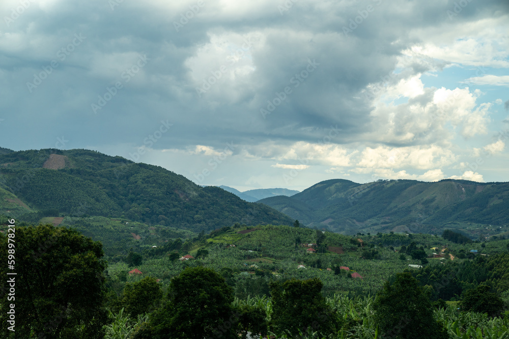 Beautiful view of the Uganda countryside, with mountains and rolling hills and farmland