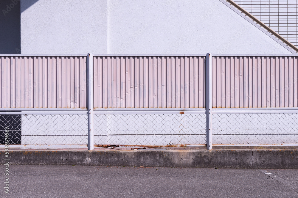 street wall background ,Industrial background, empty grunge urban street with warehouse brick wall street wall background ,Industrial background, empty grunge urban street with warehouse brick wall