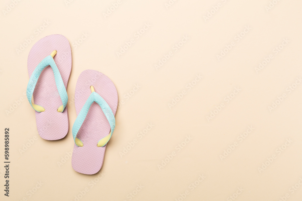 Bright flip flops on color background, top view Bright flip flops on color background, top view