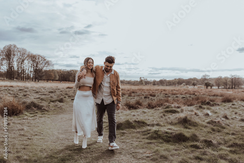 happy couple in the park on a beautiful sunny day