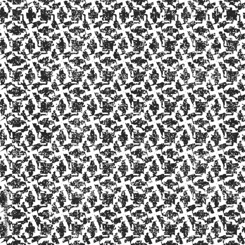Seamless abstract Spotty Graphic Motif Bleached Effect Textured Background. Seamless Pattern. Abstract grunge black and white textured patterns.