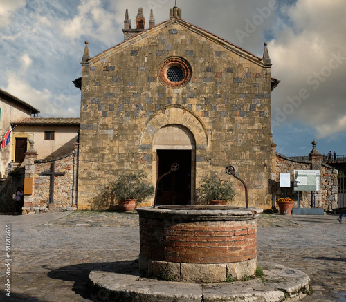 Front of Church of Santa Maria Assunta, Monteriggioni, Italy photo