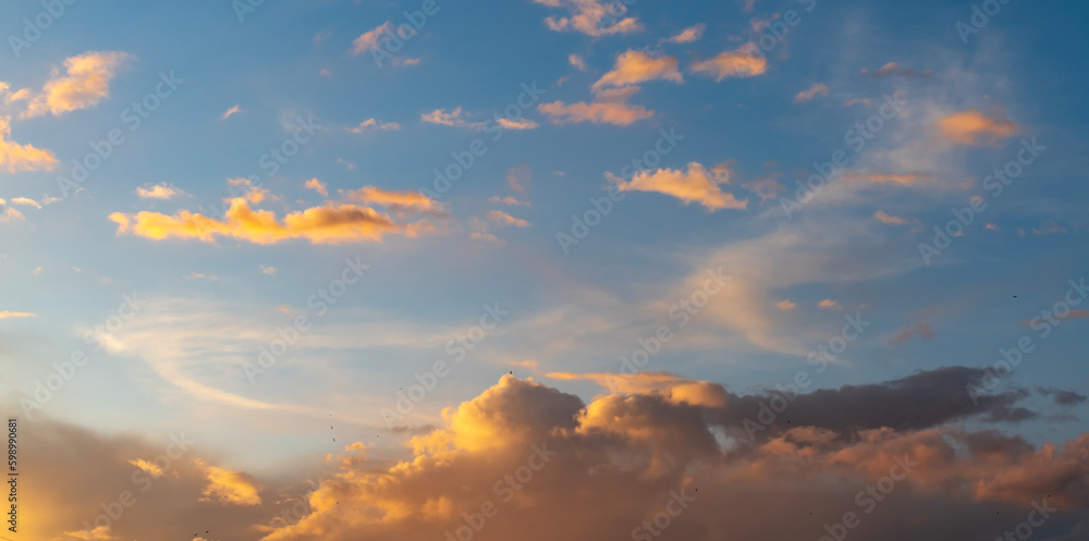 Beautiful bright summer sunset sky with clouds. Sunset sky  clouds background.